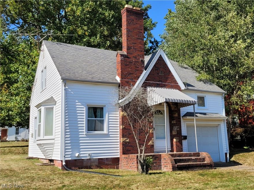 Nice sized rooms in this cute split-level home with lots of potential if you roll up your sleeves and dive in for some sweat equity. The living room has a large bay window and lots of finish woodwork. Convenient walk-up storage attic off of the bedroom. Newer hot water tank heater. The rear yard has secondary access from the alley that gives a lot of possibilities. Near city recreation center and schools campus.