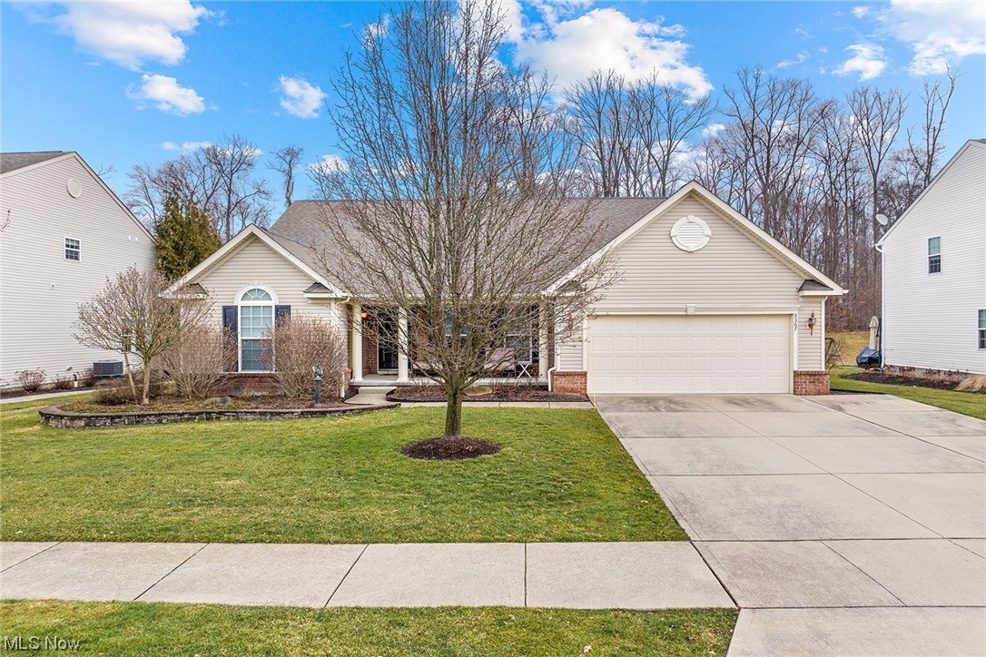 Welcome to this stunning 3-bed, 3-full bath home on a quiet cul-de-sac in the peaceful Reserve at Kensington neighborhood, offering an exquisite blend of luxury and accessibility in the heart of Twinsburg. The open-concept main living area boasts a great room with a cozy fireplace, seamlessly flowing into a gourmet kitchen featuring a wraparound granite island, stainless steel appliances, a double oven, and a cooktop. Hardwood floors adorn the space, illuminated by ample natural light pouring through numerous windows.
The first-floor laundry adds convenience, while the master suite impresses with a tray ceiling, a handicap-accessible bathroom, a private sitting area, and a spacious walk-in closet. Two spare rooms share a well-appointed second full bath. French doors lead to an office or study off the main foyer, perfect for remote work or quiet contemplation.
The partially finished basement features a full bath and common area, expanding the home’s living space and offers a work room and plenty of storage potential. A whole house vacuum and generator enhance practicality, ensuring comfort and convenience. Outside, a beautiful deck and patio overlook mature landscaping, creating a serene outdoor retreat while an inviting front porch welcomes you home.
Additional features include a sunroom off the kitchen, newer AC and hot water tank, and a sprinkler system for easy lawn maintenance. A home security system provides peace of mind. Located within the award-winning Twinsburg city schools, and a stone’s throw away to nearby parks and downtown Twinsburg, this residence is ideally situated. The 2-car garage, complete with ramp access, adds the final touch to this exceptional property. Don't miss your chance to make 9367 Sarah Ct. your new home!