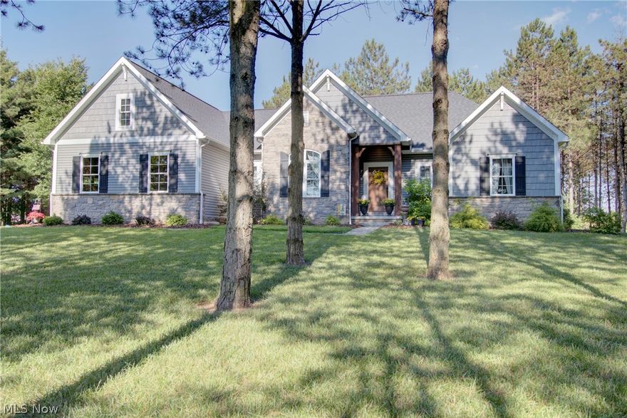 If you're looking for a nearly brand new ranch home with loads of custom finishes, yet without the expense of building today, look no further! This beautiful 3 bdrm, 2 bath home in Montville Twp (yes, no RITA!) sits on over 2 acres of land at the end of a cul de sac with beautiful landscaping, 2 firepits, a hot tub you can enjoy under the stars & a little wonderland of pines you can relax under, too! There is an open space concept between the great room, kitchen & dining area & a flex room to be used as you see fit. The kitchen has a pantry, huge island with extended cherry cabinets, granite countertops, a fully tiled backsplash & under cabinet lighting. The primary bdrm is the perfect retreat with an attached full bath & a large walk in closet. The first floor laundry has two entrances, one uniquely going to the primary bdrm. The other two bdrms are on the opposite side of the home making a split bdrm design. Some of the upgrades include a beadboard ceiling in the flex room, recessed