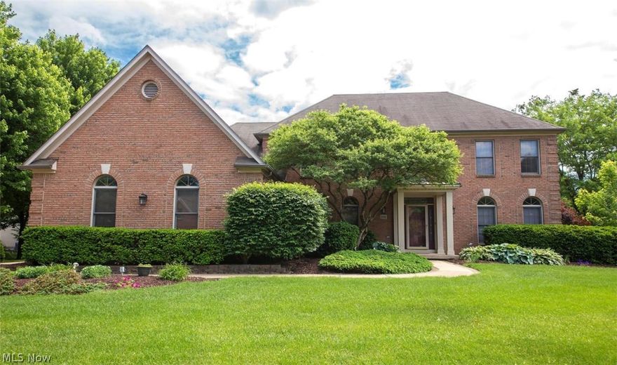 Built by Romanelli on a tree lined, private .74 acre lot, is a stunning home, welcome to 396 Windcroft.Entering the foyer, both dining and living rooms adjoin the area.An updated kitchen offers quartz, an island and loads of cabinets.There is a stepped up ceiling with high windows letting natural light filter thru the home.From the kitchen is a family room with a stunning brick fireplace.Upstairs the master has an updated bath including a huge shower.3 addtl bedrooms, 2nd floor laundry and 2 addtl full baths complete the upstairs.In the huge lower level, play a friendly game of pool or host movie night.Should you enter from the 3 car garage, find a mud room, powder room, and the private rear study.The yard is park like with trees, deck and paver patio.Visit today!