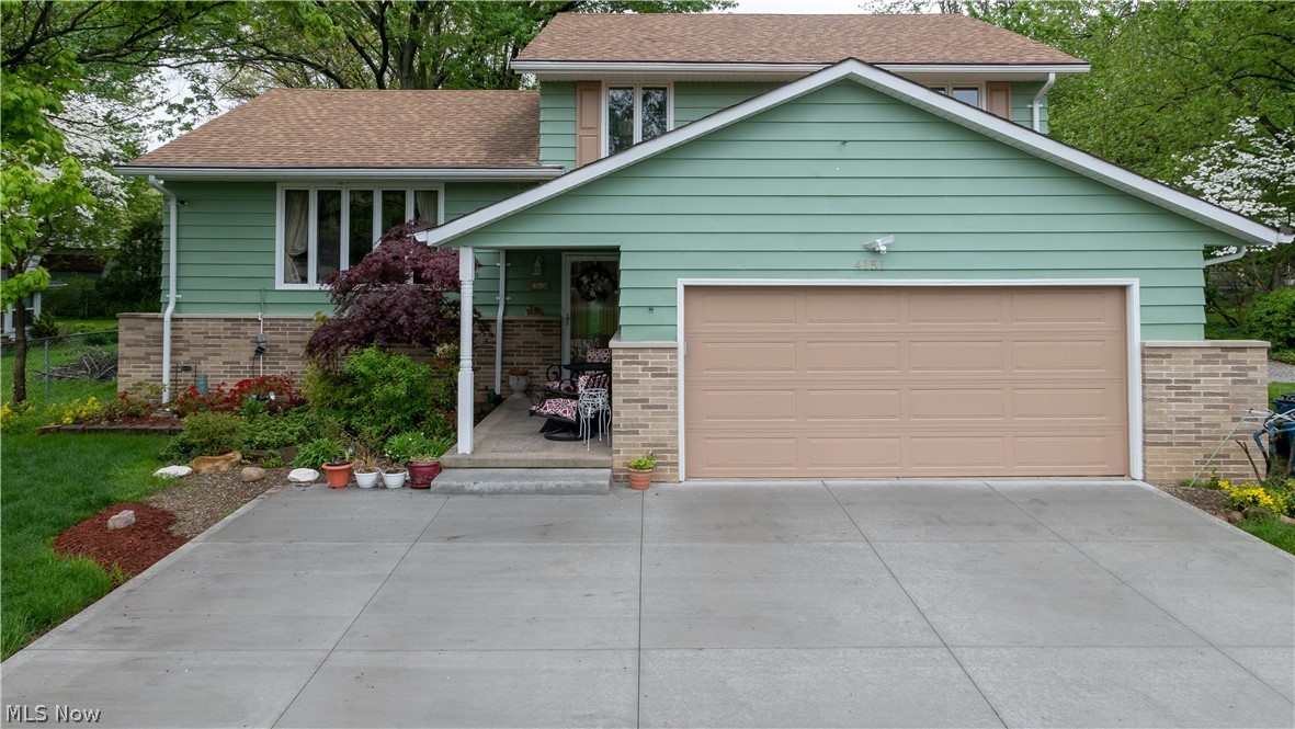 Welcome to this beautifully updated and meticulously maintained home. This large split level home has three large bedrooms and two full bathrooms. The kitchen was recently remodeled and includes newer stainless steel appliances. Additional recent updates include: New Electrical Panel in 2020, New Extra Wide Driveway with Parking Pad in 2020, Garage Door Opener 2020, Exterior Paint in 2020, Nest Thermostat in 2019, Roof and Gutter Guards in 2018, Wood to Gas Fireplace Conversion with Controller in 2018, Carpeting 2018, First Floor Bathroom Remodel in 2017, Family Room Flooring in 2017, Glass Block Windows in 2017. Large custom closet installed in basement in 2017.