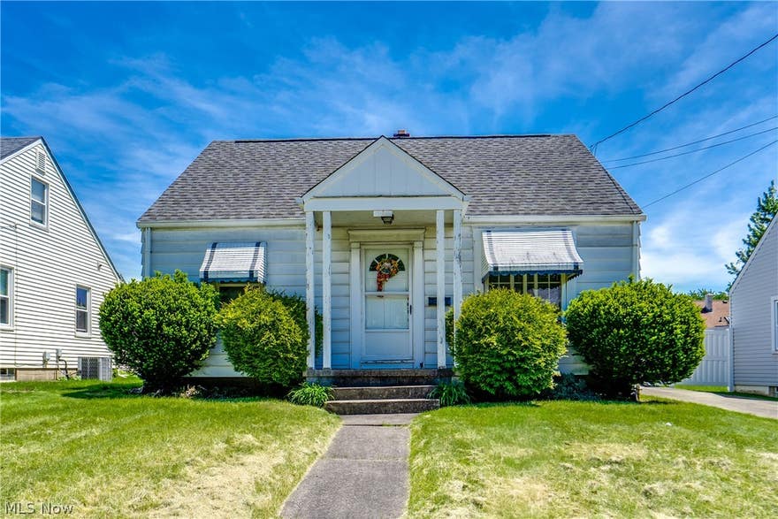 Charming three-bedroom, one-bath bungalow at 1701 Brown Street. Step inside to a spacious family room featuring a large picture window with awnings that overlooks the front yard. Two bedrooms and a full bath with newer flooring are conveniently located on the main level, along with thoughtful storage cabinets and pantry space throughout. Upstairs you’ll find a massive third bedroom measuring 28 by 12, perfect for a primary suite with ample storage. Outside, enjoy a detached garage with extra storage, a concrete pad, and a cute backyard. Easy to show!