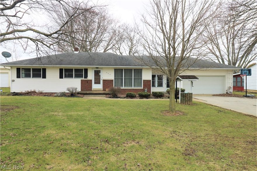 Great 3 bedroom ranch with a unique setting that is full of country-wooded views from the back windows and yard. Full basement that is part finished includes a 2nd full bath, rough cut lumber bar area, spacious family room, and plenty of storage! Large Knotty Pine breezeway offers a practicality, as well as additional finished space. Part fenced in back yard and patio, as well as a shed and 2 car attached garage! Don't miss this one!