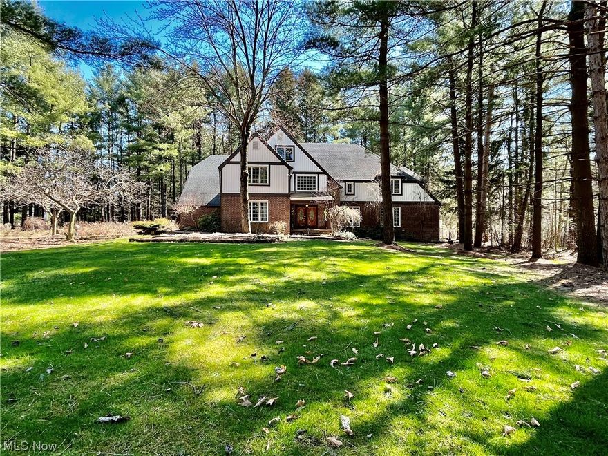 Escape to your own private retreat on 5.62 wooded acres! This stunning home features a horseshoe paver driveway, 4-car garage, and a private porch off the master suite. The 2-story great room is the heart of the home, with a floor-to-ceiling stone fireplace that creates a cozy ambiance. The eat-in kitchen is a chef's dream, with stainless steel appliances and a walk-in pantry that provides ample storage space. The first-floor bedroom with full bath is perfect for guests or as a home office. The loft office is the perfect place for your endeavors, while the additional living suite on the third floor offers a bedroom, living area, and another full bathroom. Updates include HVAC (2020), windows (8-10 years), well pump (10 years), pressure tank (3 years), and a gas well on the property with transferable royalties. This home is move-in ready and waiting for you to make it your own. Don't miss out on this incredible opportunity to own your own private retreat!