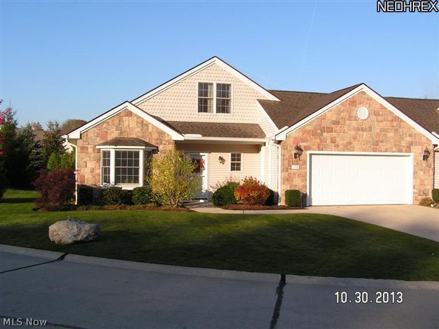 Unique one level living cluster home that is attached ONLY at the garage wall! Windows and lawn on all 4 sides make it one of only 6 in Stone Creek Homes.  Located in the back of the development away from busy SOM Center Rd, you will enjoy sitting on the screened porch and listening to singing of birds. This Cape Cod style home has 3 bedrooms and 2 full baths on the 1st floor. The 2nd floor space could be a 4th BR, a craft or hobby room, an upstairs “man cave”, studio, etc.  Large eat-in kitchen has granite counters and stainless steel appliances which stay with the home.  Vaulted ceilings in breakfast area, great room and Master BR. Floor to ceiling stone gas log fireplace. Master bath has large shower, corner whirlpool tub, Corian counter with dbl sinks separated by cabinetry. Ceiling fans in MBR, Great Room, one BR and on the screened porch. The oversize two car garage has a door to the back yard and attic access. Exclude MBath Iron Towel holders and wall lamps in MBR.