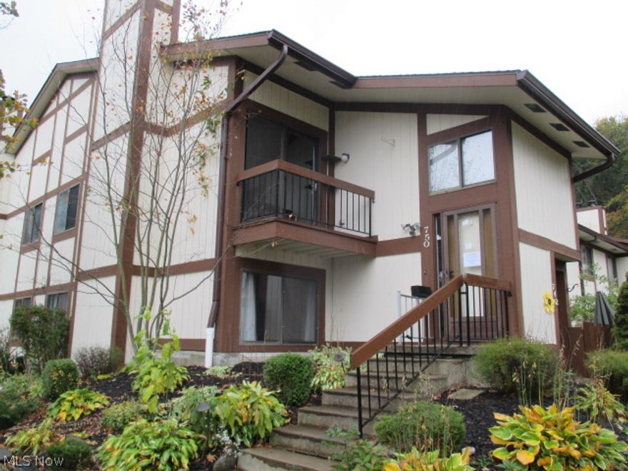 Beautifully remodeled end unit condo with vaulted ceiling in Great Room and Dining Room and new wood-like laminate and wood burning fireplace, updated Kitchen, 2 brand new Bathrooms! Maintenance free living and community clubhouse, pool, tennis & walking path!  Property sold AS IS.