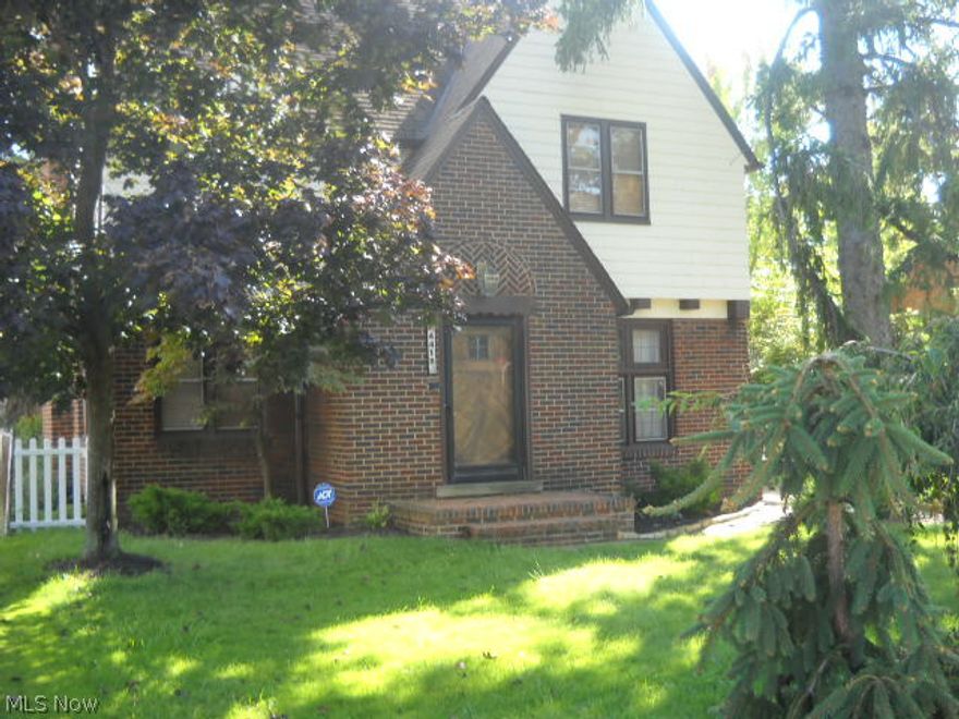 Charming English Tudor convenient to Notre Dame College. Fantastic opportunity for either an owner occupant or investor.  The spacious living room with fireplace, hardwood floors, leaded glass windows, eat in kitchen are just waiting for your touch.  3 season room overlooks fully fenced private back yard.  Don't miss this one!