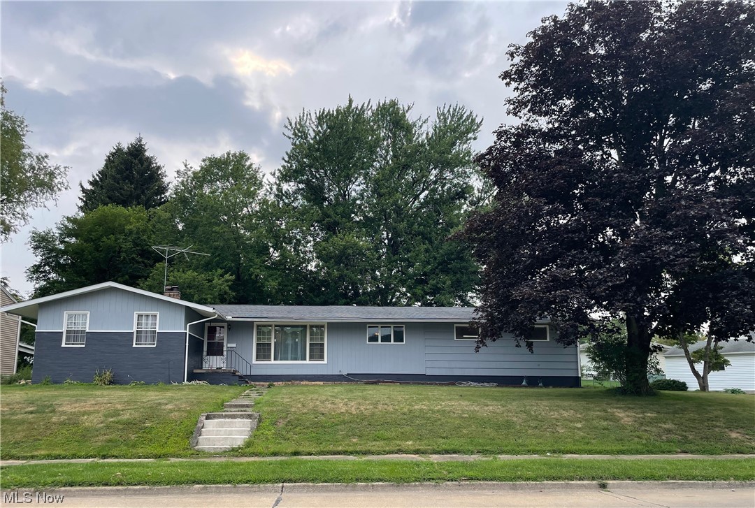 This 3 bedroom ranch has many updates. The kitchen was completed rewired and plumbing in 2019. New windows 2019. In 2021 gutter guards, drainage tile from the downspouts to front drain, 2015 appliances, and 2023 Hot water heater and tub surround. There are hardwood floors in the bedrooms and living room. The 2+ garage gives you extra room. There is a wood burning fireplace in the basement and a full bath. The bar stools will stay and the seller is offering a one year home warranty.