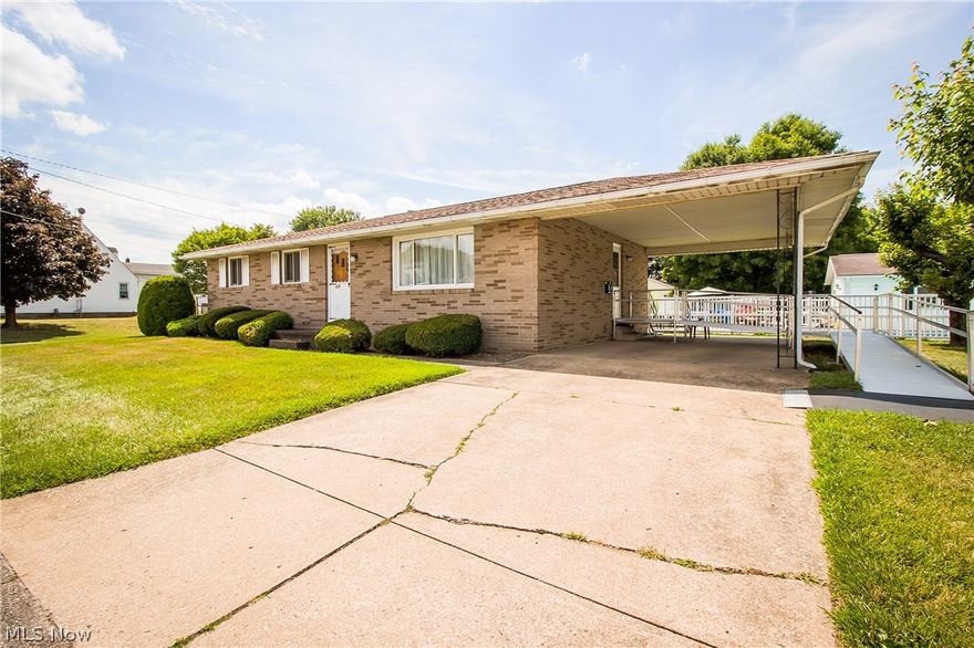 WONDERFUL ALL BRICK RANCH!  Perfect for a starter home or for the buyer who is ready to downsize, this easy to maintain ranch offers a large living room that leads to an eat-in kitchen with newer appliances.  All three bedrooms have hardwood flooring underneath the carpet and one of the bedrooms has been plumbed for a laundry!  The full bathroom includes a walk-in bathtub as well as a bidet.  The basement could easily be finished to add additional living space plus there's already a toilet, sink and shower.  Outside there's a carport with wheelchair ramp access right into the kitchen and very manageable sized yard!  Affordable, move in ready with keys at closing!