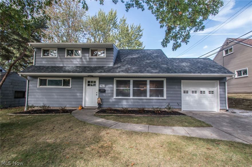 Like new, completely renovated Cuyahoga Falls Cape! The design is magnificent and the updates are endless. Enjoy the brand new kitchen with soft close cabinets, modern tile flooring, stainless steal appliances, sparkling granite counter tops, and dimensional tile back splash. The bathroom has been  completed with custom tile flooring, subway tile shower, and new vanity. Throughout the house you will be amazed with new flooring, fresh paint, modern light fixtures, and new doors and trim. Mechanically, the home has been updated with a new electric panel and wiring, and a new air conditioner. The home is conveniently located to all Cuyahoga Falls has to offer. Enjoy time at the Newberry Park across the street, minutes to Portage Crossing shopping, the new Menards and Downtown, and have convenient highway access. Call today for your private showing, this home will not last!