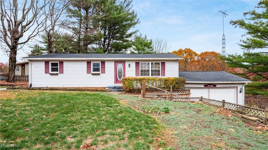 Darling remodeled 3 bedroom home on North-end.  Roof 2 years old.  New vinyl windows.  New septic tank and new aeration pump and some new electric updated throughout.  Water tap fee and water meter are already paid and ready to be hooked into the public water.  New wood-style flooring and paint throughout.  Updated kitchen with new butcher block countertops, subway tile backsplash and stainless appliances.  Updated bathroom with tiled shower walls on the main level. Lots of crown moldings.  Solid oak doors. Ceiling fans and many stylish new light fixtures.  Basement is partially finished with a bar.  Pool table and all accessories will stay.  2 car attached garage has a wood burner for heat.  Lot is over half acre.  Located near the Zane State and OUZ campus's, YMCA, walking trails, shopping and restaurants.  West Muskingum Schools.