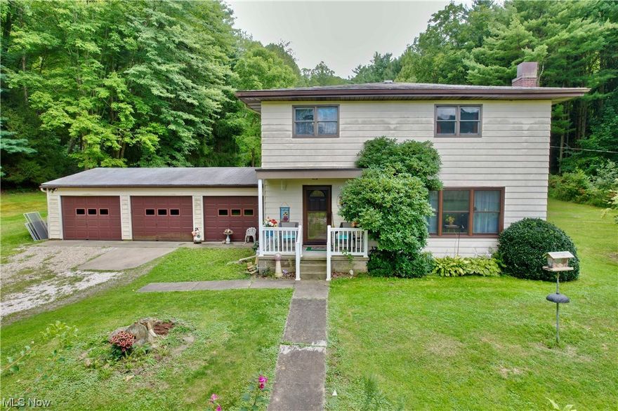 You will love this location! Just a mile out of city limits yet a quiet country setting with many Deer and Turkey to observe from the back porch. This 11.99 Acres is mostly wooded and will give you some elbow room. There is a Living Room, Kitchen and Dining Room, a BR or Den, Handicap Bath and a large 3 seasons room and Laundry on the main floor, and 4 Bedrooms and a Full Bath upstairs. The 2026 Sq Ft Cedar sided home has propane hot water heat. There's a full basement and a 3 car attached garage. Some replacement windows, Front door, a new furnace boiler, are some of the updates, plus there’s a good wood burner backup. With new floors and some paint this will be your fabulous country home! LOCATION-Southside Philly