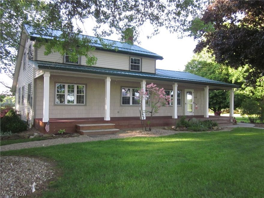 THIS ONE IS A KEEPER!  Beautiful remodeled Century Home:  fabulous kitchen cabinets, new appliances, granite counter tops, hardwood floors.  First floor master bedroom.  Covered front porch and rear porch.  Two car detached garage plus outbuilding.  Beautiful views of the acreage, fruit trees, blackberries & blueberries.  Small goat barn and fence.  MUST SEE!  CALL TODAY FOR A SHOWING!