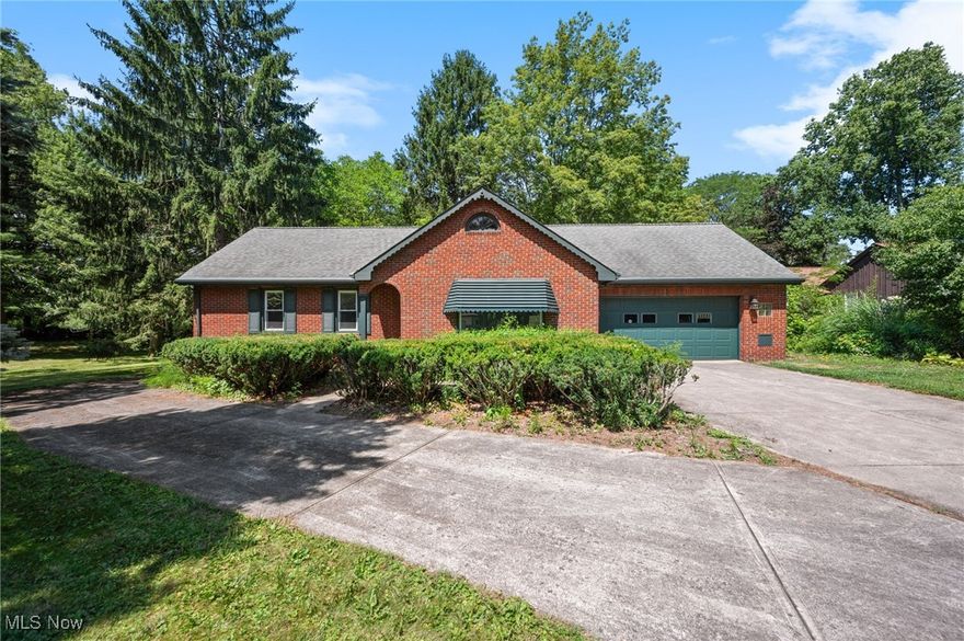 This all-brick Ranch home in the Country Club Estates neighborhood of Wickliffe is set on a wooded .69-acre property and conveniently located near I-90, OH-2, and OH-91, plenty of shopping and restaurants, parks, golf courses, and other local attractions. With over 1,504 living sq ft including a finished attic with two separate spaces that could serve as a primary suite, additional bedrooms, home office, or recreation area, this well-maintained home offers plenty of space and flexibility. The home features hardwood floors throughout most of the main level, 3 bedrooms, and a full bath. A living room includes a large picture window, and an eat-in kitchen with dinette area opens to an enclosed 3-season room with access to the spacious backyard. A full basement with plumbing provides potential for a second full bath or added living space. Additional highlights include an extended driveway leading to a backyard storage shed and an attached 2-car garage with a nature stone floor. Property being sold As Is and piano is included.