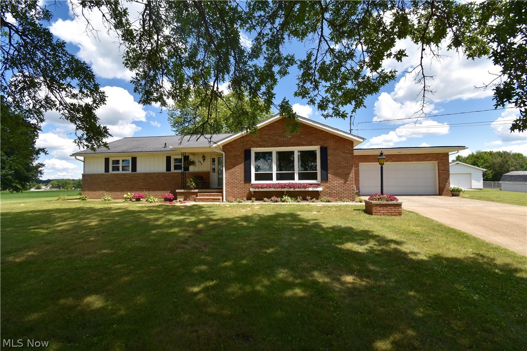 Welcome to 157 Pine St, a gorgeous home located on a double lot! Enjoy the country farmland views located in the front and back of the home while still having easy access to downtown entertainment. Find your culinary inspiration in this brand new 2020 custom-designed kitchen with stainless steel appliances. The open floor plan offers luxury vinyl tile throughout the kitchen, dining room and entryway as well as a fireplace and access to a beautiful back patio! Extra space on the lower level including two rec areas and a full bath. Furnace and A/C replaced in 2018 and water softener in 2020. Attached 2 car garage and a shed in the backyard with electric! Schedule your showing today!