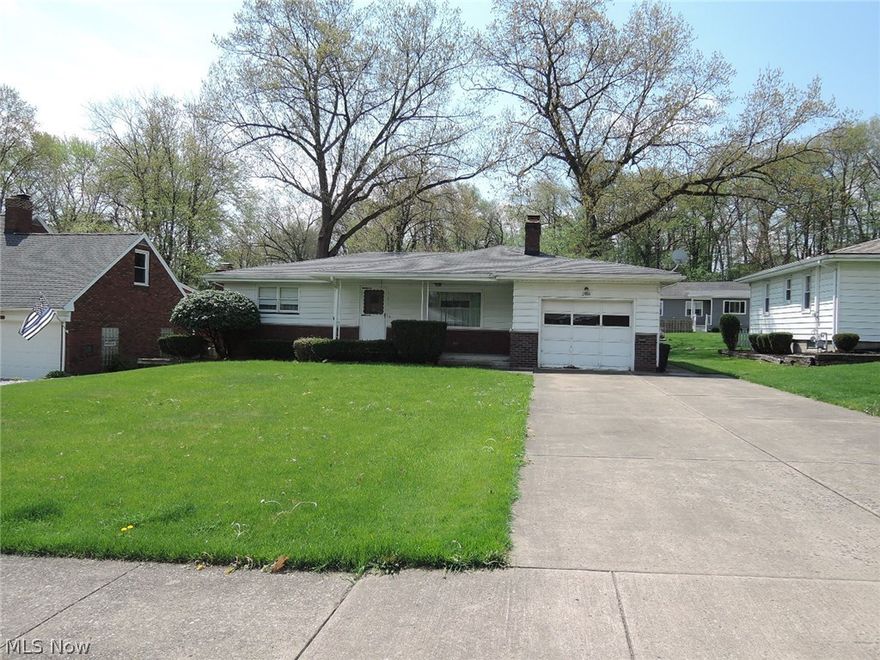 Great ranch one floor plan! Walk in to a large living room with nice brick faced electric fireplace. (owner never used). The huge kitchen and dining area have plenty of room! Tons of cabinets and counter space here! Awesome built in hutch. Three nice sized bedrooms with ample closet space. The first floor full bath has a linen closet plus tub shower combo. There are hardwood floors under all the carpeting.The full basement has a second bath that needs some work as well. This home has an attached one car garage. Covered front porch! The backyard is spacious. Roof 1999. Central Air.  If you are open to making some updates and would love a great floor plan to work with this is one definitely to consider! Inside pics coming soon!