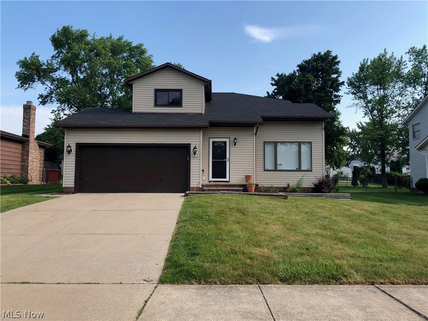 A Great Home in desirable Maple Heights neighborhood with open floor plan and plenty of space. Newly Remodeled kitchen with stainless steel appliances included, granite counter-tops, and under mounted sink. New floors throughout the first level. Large living Room with vaulted ceiling flows into formal Dining Room. Three good sized Bedrooms, Master Bedroom with large walk in closet. Sliding door in the kitchen opens to extremely large Deck for enjoying the natural environment and grilling out on special occasions. Home is move in Ready and Violation Free! Come take a look Today!