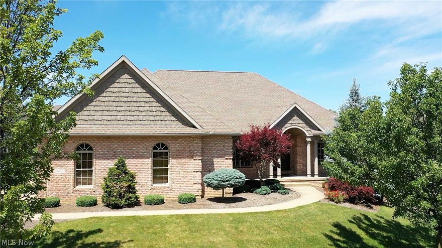 Welcome to this custom-built ranch-style villa in Saint James Place! It is a WOW for sure! Open and meticulous with three bedrooms and 3 1/2 baths. Large foyer entry, formal dining, 1st-floor office, beautiful spacious great room/fireplace, and gourmet kitchen with all the built-ins and extras you would expect! The kitchen is open to a bright and cheery hearth/breakfast room with doors leading to a covered deck and patio—private guest suite w/full bath and walk-in closet. Master suite with luxurious bath and spacious closets adjoin the 1st-floor laundry. The great room is open to the beautifully finished lower level - family room fireplace and Br 3 and full bath. So many custom features and details. There is lots of storage, basement stairs to the garage, security system, central vac, sprinkler front yard, wired sound speaker to the patio, and the great room. The list of extras goes on and on. Take a look for yourself! You will love it!