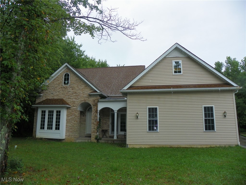 Spacious 3 Bedroom, 3 Bathroom Ranch that's situated on 5.21 acres ! Large Kitchen with tons of cabinetry, granite counter tops and a vaulted nook/eating area * Laundry Room conveniently off of the Kitchen * 2 Bedrooms and a Full Bathroom are located off of the Kitchen area * Enclosed porch/Sunroom off of the Kitchen with 3 sliders that lead to the backyard * Ceiling fans in a lot of the rooms * Spacious Great Room with a WBFP * In the front of the home, you'll find a Den/Office with French doors and an inviting Entry/Foyer * On the opposite side of the home, you'll find an office (possible 4th. Bedroom) with multiple windows, another Full Bathroom * Also on that end of the home is a beautiful Master Bedroom with a tray ceiling, access to the porch/Sunroom, a WIC, soaking tub and a shower * This home has an abundance of windows for natural light * Extra large 2 car garage * Basement with pre-poured walls, glass block windows and a sump pump * Huge 30x40 barn for tons of extra storage * Huge secluded 5.21 acre lot that sits way back off the road * With a little TLC and some updating, this home can be amazing again !