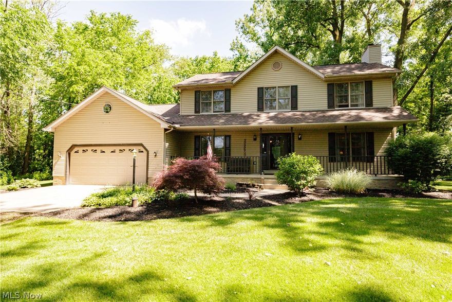 Enjoy the feeling of living in the country in this beautiful 4 bedroom, 2.5 bathroom home sitting on a private and peaceful 2 acre wooded lot in Canton South. The main level features an open floor plan having an updated kitchen with tile floor, breakfast bar and plenty of cabinet and counter top space, an eating area with sliding glass door leading to a deck overlooking the back yard that's perfect for watching the wildlife and entertaining family and friends, a huge living room with brick fireplace, a formal dining room with hardwood flooring, an office/bonus room, a 1st floor laundry room and a 1/2 bath. Upstairs has a large owners suite with cathedral ceiling, a walk in closet and a private owners bathroom, 3 more ample sized bedrooms and another full bath. Other features include a relaxing front porch, a full basement that was professionally waterproofed with potential to be finished and offers plenty of room for storage, a 2 car garage with opener, a storage shed, a newer furnace,