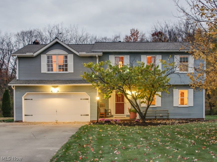 This delightful, updated, colonial has 4 bedrooms, and 2 1/2 baths. The Owner's Suite is an addition to the home and boasts a cathedral ceiling, huge walk-in closet, another wall closet, and private owners suite bathroom with double bowl sinks, ample countertop space, shower and a separate whirlpool soaking tub! The laundry room is on second floor along with lots of closet space for the other 3 bedrooms. There is a gas fireplace in the great room. The kitchen opens to the dinette area and leads out to the two tier deck and pool! The deck and fence were painted in 10-14. The flooring in the Foyer, Living Room and Dining Room are new as of 10-14. The roof was updated in 2012 and the water heater in fall of 2013. Last but not least, the garage is heated and has hot and cold water.