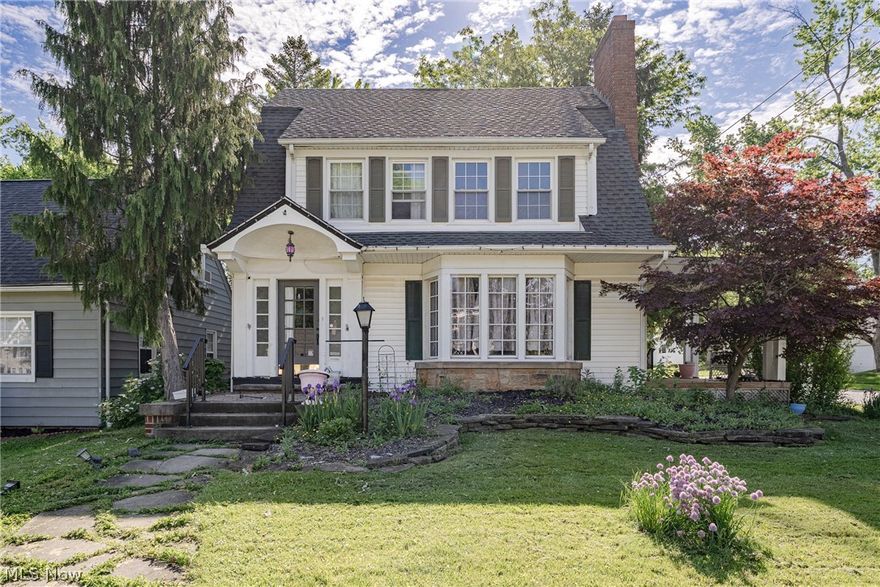 Welcome to 1665 Maywood Road, South Euclid – A Charming Colonial on One of the City's Most Desirable Streets! Rich in character and filled with potential, this spacious home presents a unique opportunity for buyers looking to restore and personalize a true classic. Ideally located within walking distance of the South Euclid Library, the future Akron Children's branch campus, and the area's country club, the property offers both convenience and a highly sought-after setting.

Step inside to a warm and inviting living room featuring beautiful hardwood floors, a cozy fireplace, and neutral décor that provides the perfect canvas for your vision. The home offers generous living spaces designed for everyday comfort, entertaining, and creating lasting memories.

The second floor features three comfortable bedrooms, while the third floor offers a private fourth-bedroom suite complete with custom closets and a full bathroom—ideal for guests, a primary retreat, or flexible living arrangements. With 4 bedrooms, 2 full bathrooms, and 1 half bath, there is plenty of space to accommodate a variety of lifestyles.

Outside, the beautiful side lot provides abundant room for outdoor enjoyment, gardening, and recreation, making it a wonderful setting for those with a green thumb. While the home would benefit from updates and improvements, its timeless architecture, desirable location, and spacious layout make it a true hidden gem with endless possibilities. Whether you're looking to restore its original charm or create your dream home, this property offers an exceptional opportunity to build equity and bring your vision to life.

Don't miss the chance to unlock the potential of this South Euclid classic!