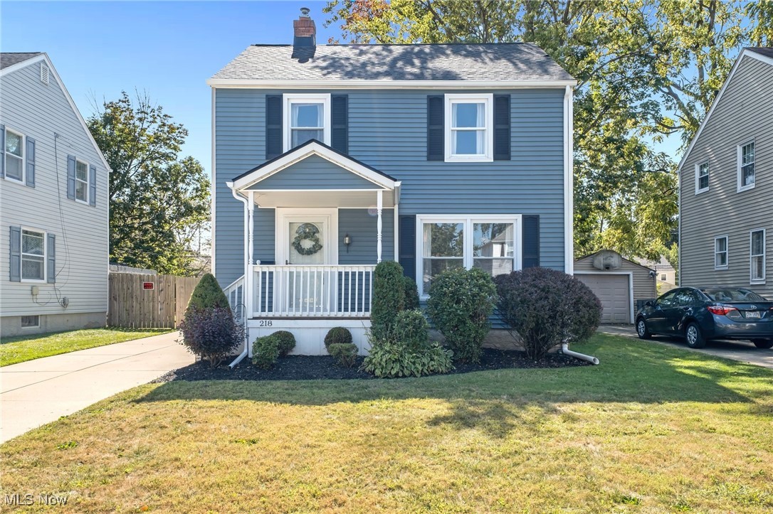 This beautiful colonial home packs a HUGE punch with curb appeal, inviting front porch and many notable improvements! Main floor features a large living room & dining room both with updated flooring! Clean white kitchen comes with stainless appliances and extra storage! Second Level boasts 3 bedrooms, all with new carpet and spacious closets. A full bathroom with tiled floor completes this level. Lower level has been waterproofed and painted and comes with a transferable lifetime warranty! The exterior features a large backyard and oversized 1+ car garage. Notable updates include: Roof (2025), Vinyl Siding (2025), New flooring (2025), Refreshed front porch (2025), Waterproofing (2025), Updated Hot Water Tank, Furnace, Central Air and fresh Paint throughout! With a central location to restaurants, shopping and NEW Schools, this home is the complete package!