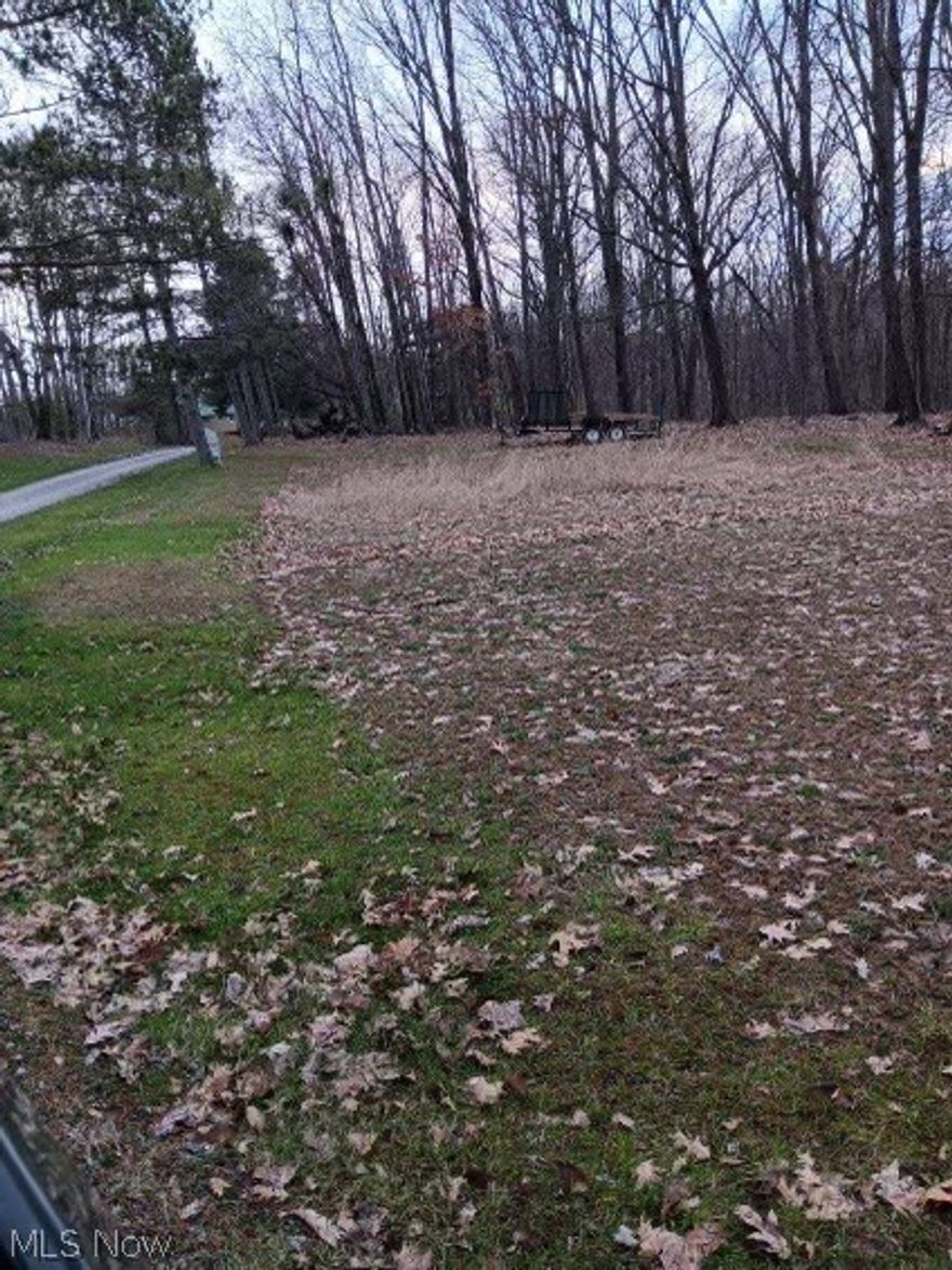 BACK ON AT NO FAULT OF SELLERS! This private, ready to build on lot is located in Ridgewood Acres Subdivision in East Muskingum Local School District! 2.6 +/- acre tract composed of 4 lots. 15,000 square feet +/- cleared and ready for building! Tucked away on a low-traffic road, there is plenty of privacy. Appointment is required, do not walk land without an appointment. Mineral rights do not convey. Public water in neighborhood for new owners to secure water tap. Electric available.
