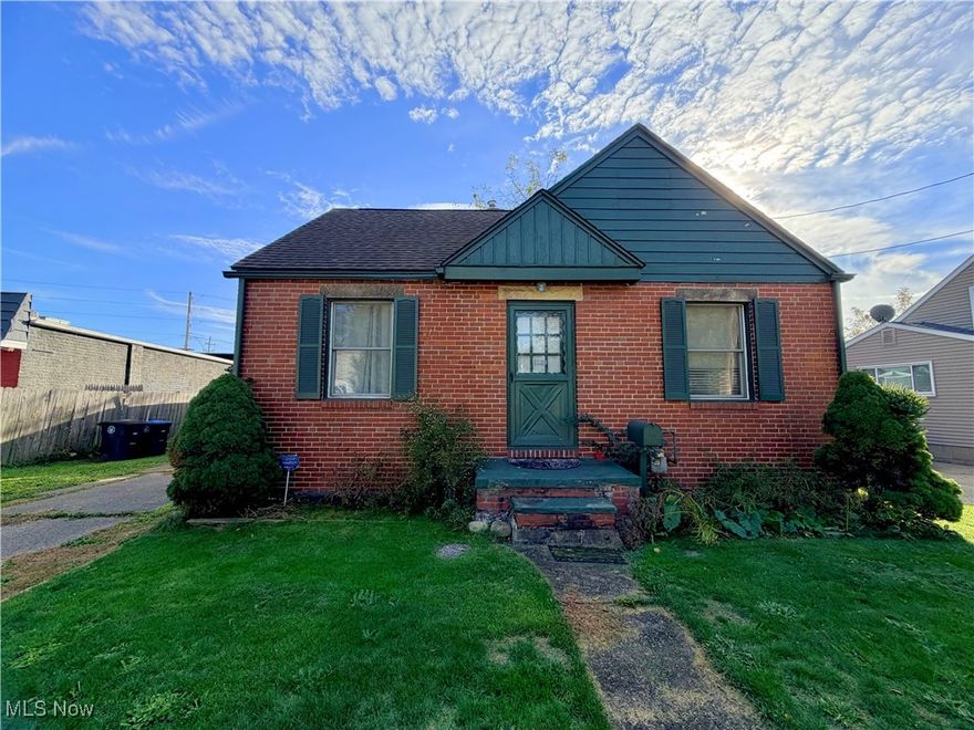 Move-in ready cozy brick wrapped cape cod with a finished attic as a 3rd bedroom or bonus room.  Solid floors throughout.  Spacious basement with a partitioned room for more storage or gym.  Detached, cinder block garage connects the fenced-in backyard with a shed.  Located near parks, shops, and only minutes away from the highways.