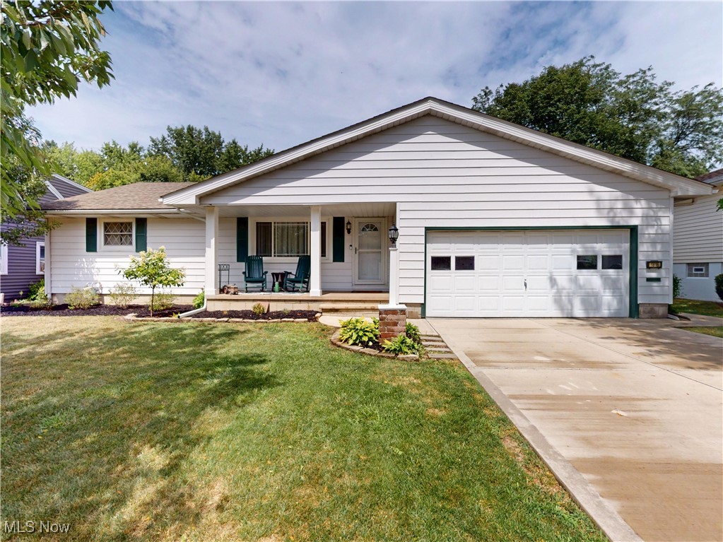 Welcoming this beautifully maintained 3 bed, 2.5 bath, ranch style home to the market! Upon arrival, you'll immediately notice the home's curb appeal with its charming landscaping and newer driveway and sidewalk. The covered front porch welcomes you into a spacious living room with gorgeous French doors. Stay cozy in the winters with your very own gas fireplace and a 2 car attached garage. The spacious kitchen and dining room allows you to flow through the house with ease while light floods in through the sliding door which leads to a beautiful private and wooded backyard. The guest powder room has been beautifully updated and is conveniently located for entertaining family and friends. 3 bedrooms with ample closet space and a full bath can be found just down the hall. First floor living at it's finest! For more storage space than you know what to do with, head down into the gigantic and dry basement - which is the same sq ft as the main floor. The washer and dryer will stay, along with all kitchen appliances. The seller is offering a 1 year home warranty for added peace of mind. Roof, hot water tank, and HVAC newer! Do not miss out on this one or you'll regret it. Schedule your private showing TODAY!