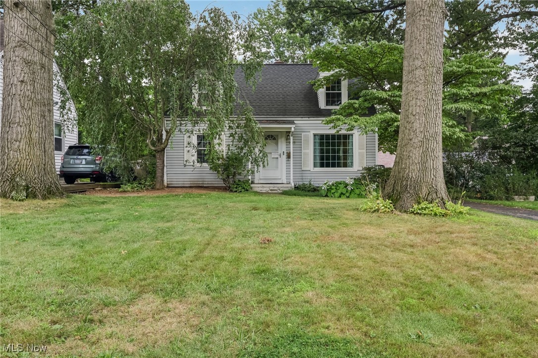 Step inside this adorable Cape Cod and feel right at home! The first floor features a professionally finished laundry room that's both stylish and functional, plus an enlarged full bath and a spacious closet that connects to the bedroom and laundry Super convenient. The cozy first-floor family room is a total highlight, with a vaulted pine ceiling, big windows that let in tons of natural light, and a great view of the backyard and deck. The kitchen is beautifully updated with black countertops, classic white cabinetry, and sleek laminate flooring appliances included and flows into the dining room. Upstairs, you'll find an updated half bath and a vaulted bedroom with a dormer, deep closet, and bonus storage nooks. The basement offers a finished rec room with paneled walls and a drop ceiling. Other perks include a 2018 roof, newer light fixtures, vinyl replacement windows, HVAC and ac installed 2021-22, and a newer high-efficiency hot water tank.