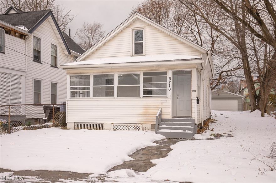 Charming Cape Cod in Cleveland with 3 bedrooms, 1 bathroom, and an enclosed front porch. Home features vinyl siding, forced-air heat, full basement, and 1,149 sq. ft. of living area. Solid layout with great potential for renovation or long-term rental. Convenient location near shopping, parks, and major highways.