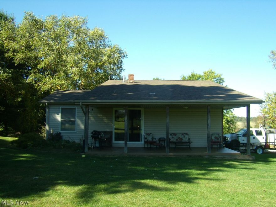Nice 3 bedroom, 1 1/2 bath split level home on almost 2 acres.  Open floor plan, finished lower level family room, 1 car attached garage and covered porch.  Large barn, great for storage and a workshop.