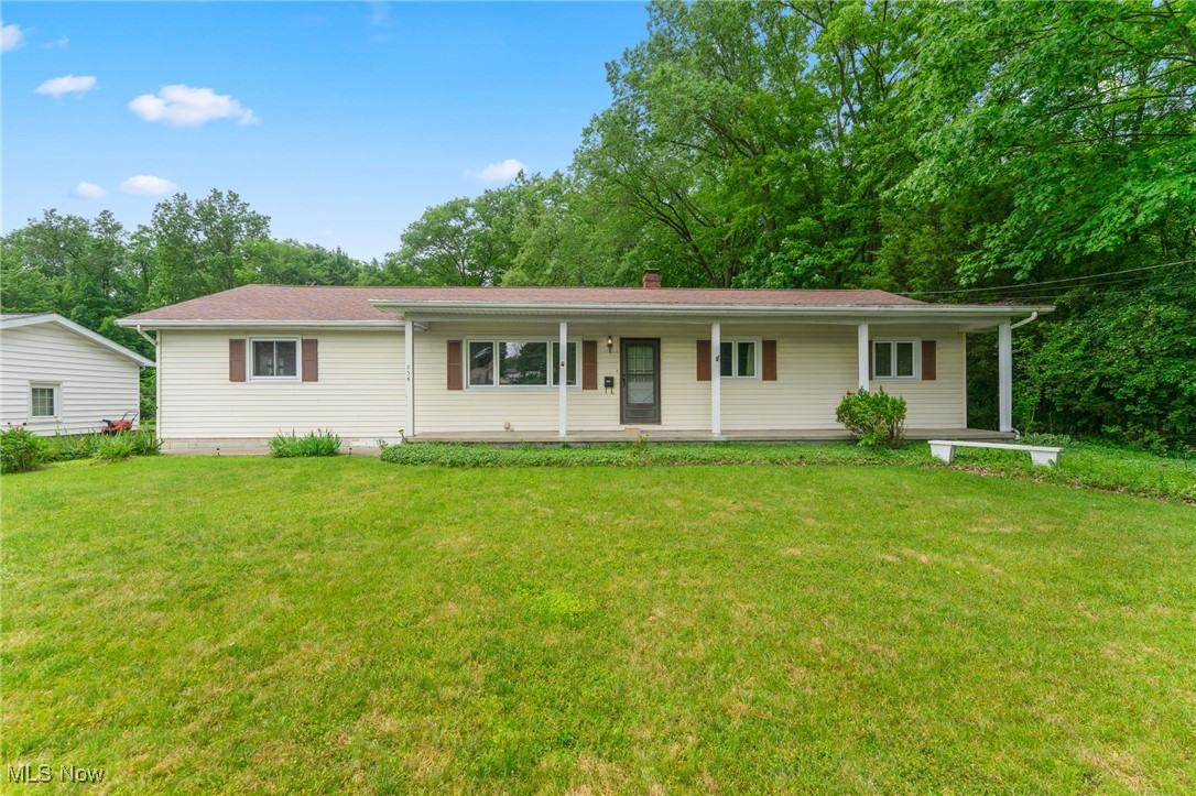 If a quiet, dead end location is on your must have list then this one is it. Situated at the end of the road and surrounded by woods, this home is nicely tucked away and private. The main floor consists of an open concept kitchen and dining area and hardwood throughout the living spaces and bedrooms. The full bathroom is attached to the master bedroom for your convenience. The sunroom off the back has three sides of windows. The lower level is ready to be finished and has another full bathroom. Newer windows and furnace.