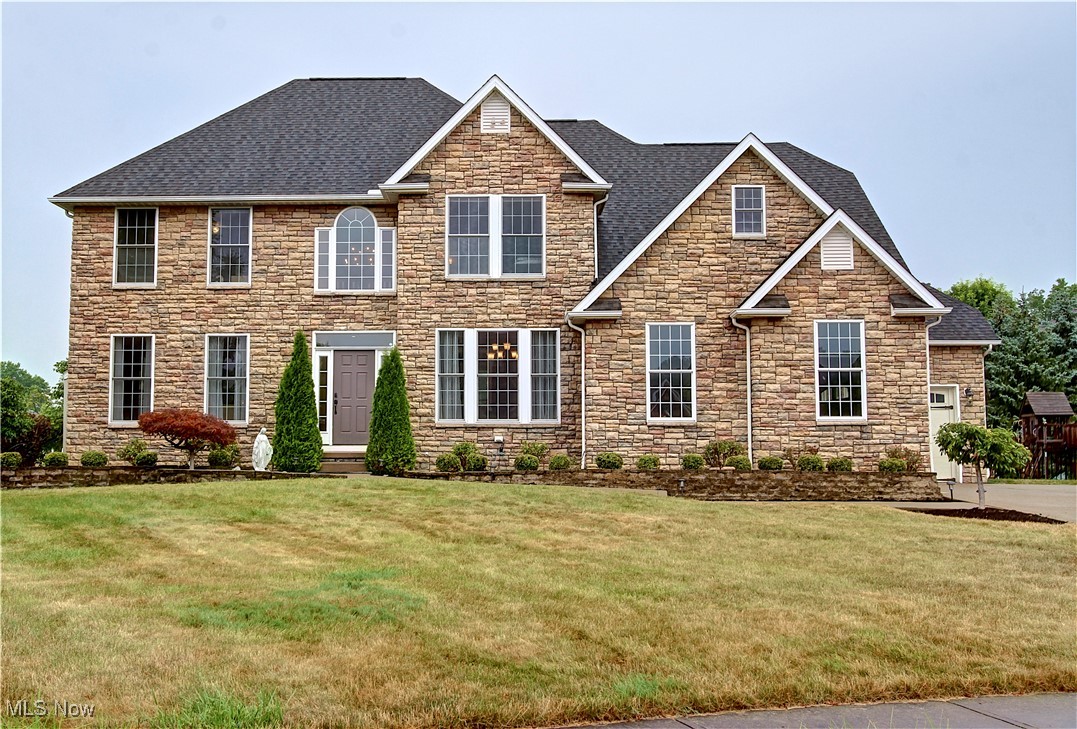 Welcome to 31916 Fieldstone Circle – A Refined Retreat in the Heart of Avon Lake
Tucked away on a quiet cul-de-sac in the sought-after Bridgeside community, this stunning 4-bedroom, 3.5-bath colonial offers over 3,000 square feet of beautifully updated living space and a lifestyle of everyday luxury.
Step inside to a dramatic two-story foyer that sets the tone for the open and airy floorplan. Hardwood floors lead you through a spacious main level designed for both elegant entertaining and comfortable family living. The formal living and dining rooms exude sophistication with tray ceilings and abundant natural light, while the inviting family room opens seamlessly to the gourmet kitchen—complete with granite countertops, stainless steel appliances, pantry, and breakfast bar.
The first floor also features a well-appointed laundry/mudroom with walk-in closet and built-in storage for added convenience.
Upstairs, the expansive primary suite is your private sanctuary, offering a spa-like bath with dual vanities, a jetted tub, a separate shower, and a large walk-in closet. Three additional bedrooms provide ample space for family, guests, or a home office—with one bonus room featuring vaulted ceilings perfect for a remote workspace or playroom.
The finished basement, updated in 2018, expands your options with a large rec room, kitchenette, half bath, and a bonus bedroom or flex space with its own closet.
Outside, enjoy summer evenings on the back deck overlooking a peaceful, partially fenced yard with views of the stocked pond and fountain. A sprinkler system and oversized 3-car garage complete the package.
All of this is located within walking distance of parks, close to award-winning Avon Lake schools, and just minutes from Lake Erie, shopping, and highways.
This is more than a home—it’s a lifestyle. Don’t miss your chance to make 31916 Fieldstone Circle yours.