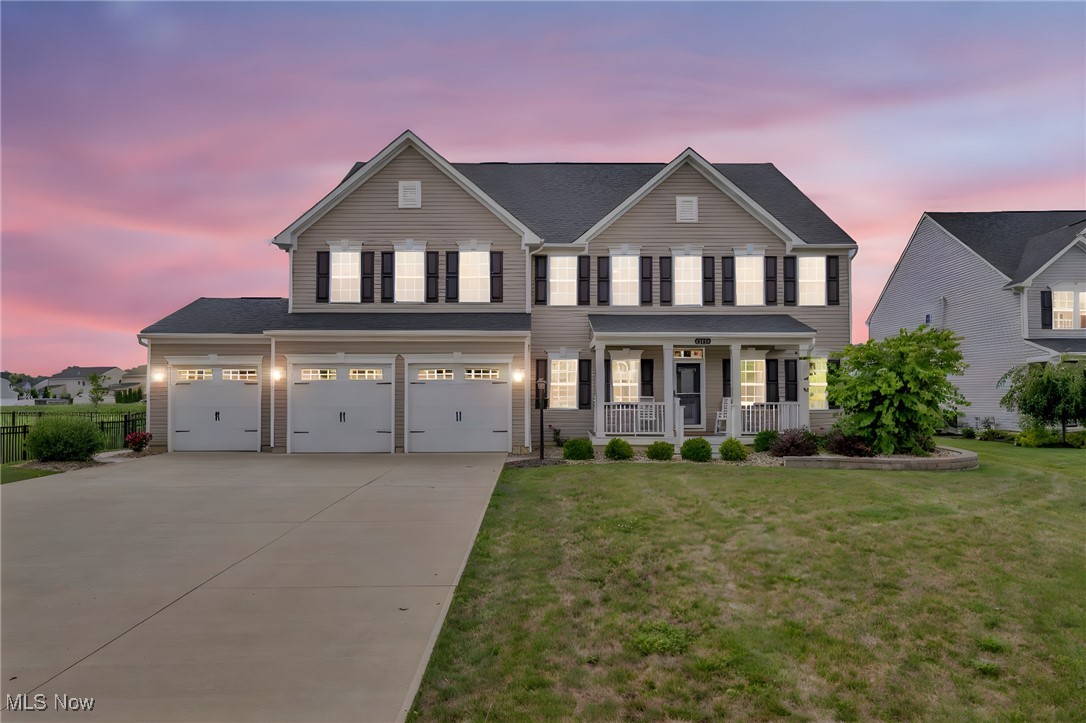 Welcome to this stunning Versailles model in the sought-after Hunting Meadows community of Columbia Station—an area quickly emerging as one of Northeast Ohio’s most dynamic places to live. Built in 2021 and lived in lightly by adults only, this home offers more than 4,500 sq. ft. of upgraded luxury that would cost hundreds of thousands more to duplicate today. Designed for modern living, it features soaring ceilings, an open floor plan, and a massive loft overlooking the dramatic great room with fireplace. The chef’s kitchen boasts a large bar island, premium appliances, and an adjoining home office area. The owner’s suite is a true retreat with sitting area, walk-in closets, and a spa-like glamour bath. Upstairs laundry adds convenience. The full basement—already plumbed for a bath—awaits your custom entertainment vision. Outside, experience your own Las Vegas-style oasis: a fully fenced yard with in-ground pool and resort-inspired hardscaping. Perfectly positioned on a quiet cul-de-sac lot, this property also offers a 3-car garage with custom epoxy flooring. With 5 bedrooms, 4 Full baths, and unmatched craftsmanship throughout, this is the lifestyle upgrade you’ve been waiting for. At $924,900, it delivers extraordinary value—why build when your dream home is ready now?