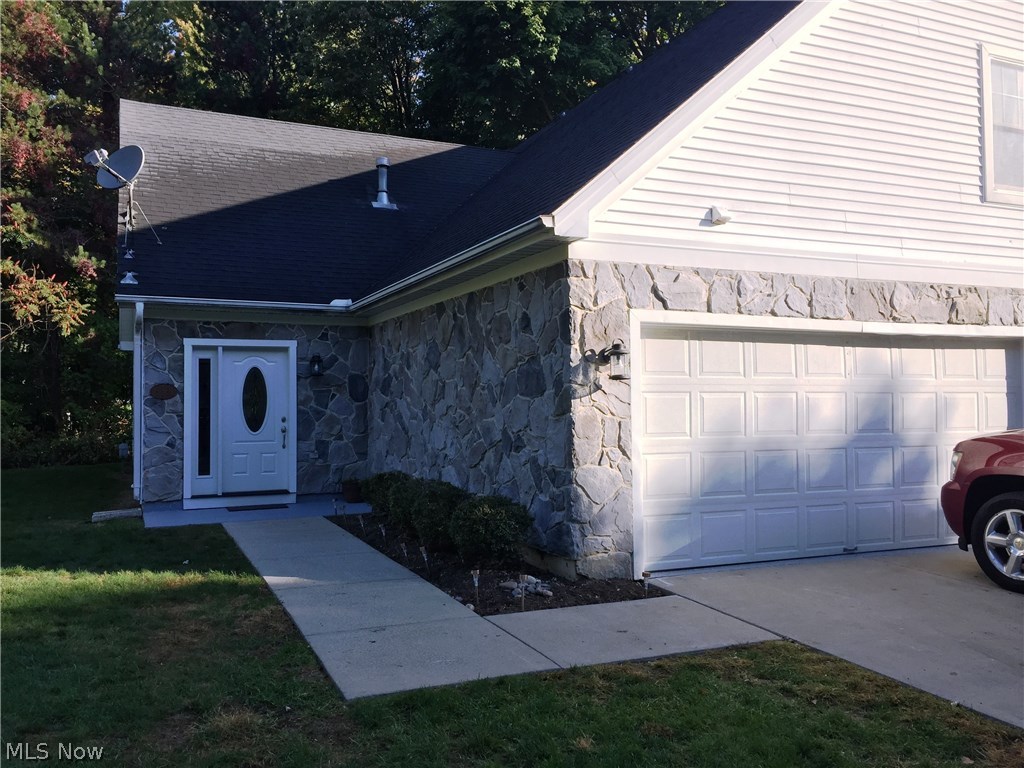 Welcome home to this extremely unique condo offering high end finishes and modern decor updated in 2016! As you enter the home you will notice the new front door and marble foyer. Continue through, you will enter into the spacious and open living and dining area. The gas fireplace is a perfect compliment for the space. Off of the dining area is the completely remodeled kitchen. The kitchen features new cupboards, granite counters and a modern mozaic back splash for character. The laundry room is located off of the 2 car garage for easy access. There is a spacious master bedroom and bathroom on the main floor as well. Upstairs you will enter into an open recreation/family room area with so many possibilities. The second floor holds two large bedrooms connected by a Jack and Jill bathroom with granite counter, double sink and new fixtures. Schedule your private showing for this lovely home today before it is gone!
