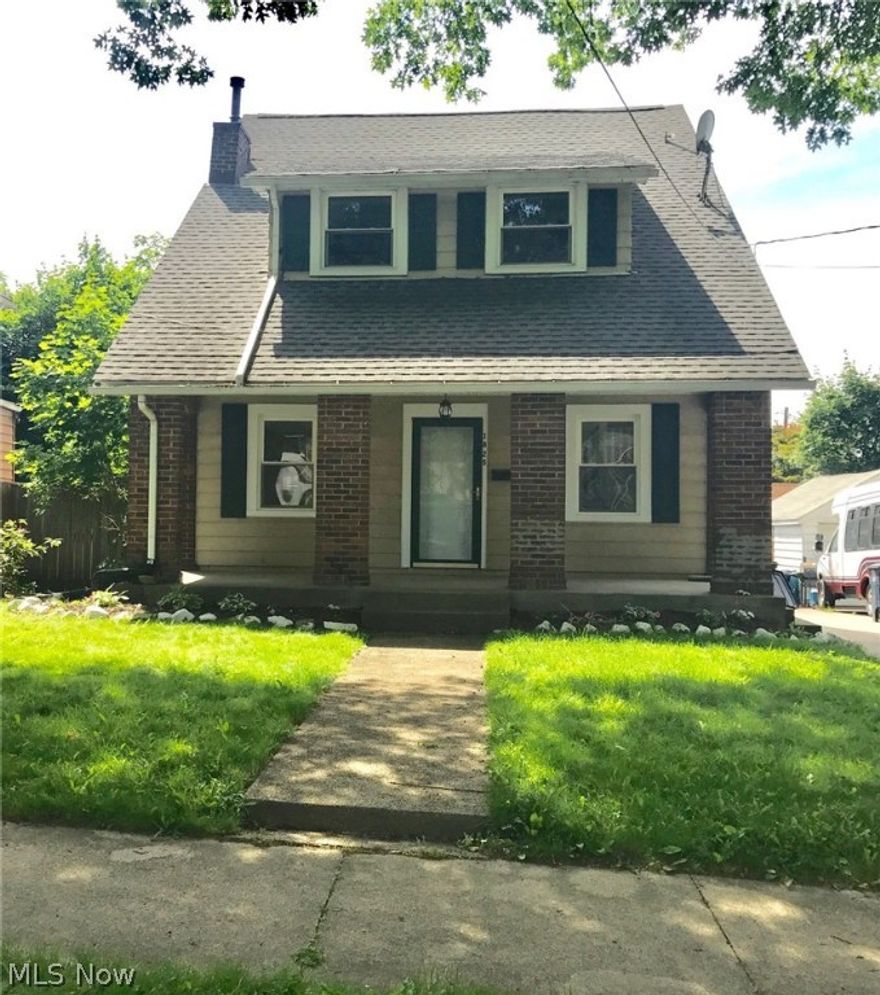 This charming, updated 3 bedroom Colonial located in Akron is a must see! This home offers over 1300 sq.ft. with many updates that include stunning refinished wood flooring in the living, dining and bedroom areas, new kitchen flooring, counter tops, sink, hardware and new appliances. The upstairs bath offers new flooring and cabinetry. New hot water tank, 90% high efficiency furnace '08, newer vinyl windows and new garage roof w/30-year shingles. This lovely home has been freshly painted and offers new lighting and so much more! HMS home Warranty offered for peace of mind!