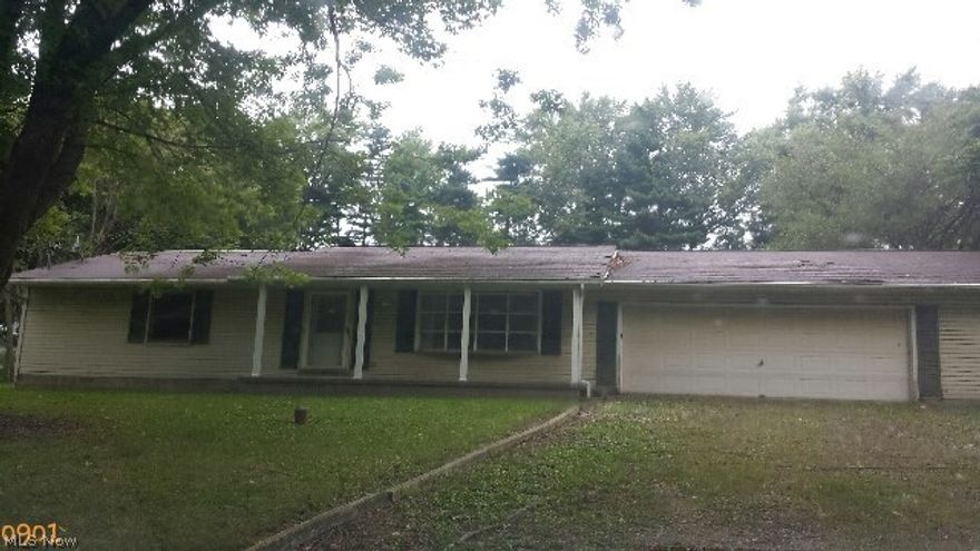 2 bedroom ranch offers large kitchen with sliders, partially finished basement. Over sized garage with tons of storage. A must see to appreciate, great starter home