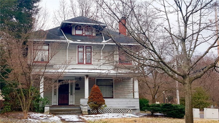 Old world charm waiting on your final touches. Nine foot ceilings throughout first floor - large kitchen with island and sunny and bright eating area, formal dining room with maple floors, first floor office - with separate entrance. Living room with antique mantle, large and graceful foyer with ceramic tile floors, the wood work in this house is breathtaking - such quality. 4 bedrooms on second floor with a full bath and half bath - great closet space - finished 3rd floor would be a great play room, or another bedroom suite. Updated electric and furnace - covered patio in the backyard leads to a 2 car garage.
