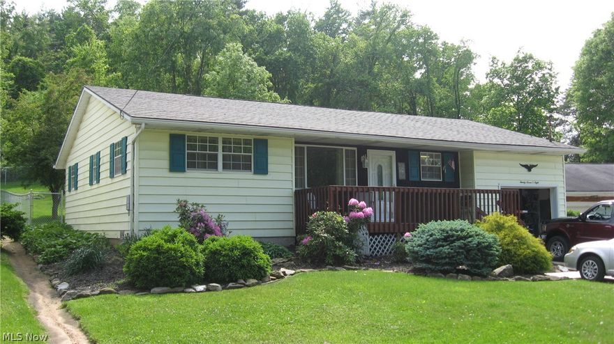 Large living room and dining combo.. 2 bedrooms, possible 3 - one bath.  5 ft chain link fence.  new roof 2014