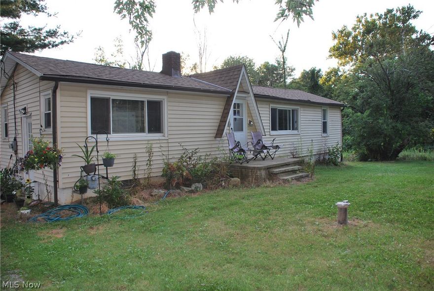 Reduced to sell or will rent! Awesome property backs up to Cuyahoga Valley Towpath! 2 parcels zoned Retail Commercial, use was most recently Legal Non-Conforming Residential.  Easy highway access!  LARGE garage / storage barn w/ plenty of room for recreational vehicles including boats, RVs, all terrain vehicles, plenty of room for all your other recreation toys like kayaks, paddle boards, fishing boats, etc! There is even a second floor w/separate entry to allow for divided tenancy for storage, workshop, retail gallery or studio! You could have most any retail business here! Home features a huge deck looking over the large backyard with firepit, watch the numerous birds & other wildlife! The ranch home features 1st floor living w/ master bedroom on one end & second bedroom on the other flanking the living space! Galley style kitchen is off the side entry which opens to a nice sized living room & open concept dining area has French double doors to the back deck! Many updates including F