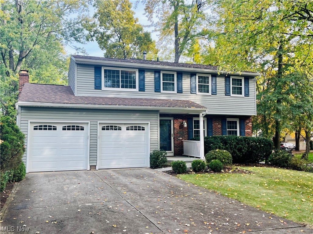 Welcome home to 1545 Hanna Road in Stow! This 4-bedroom colonial is situated on an amazing lot, located on a cul-de-sac. Surrounded by woods and privacy, there is an abundance of space to entertain and run free. The front porch welcomes you into a well laid out first floor. The large living room flows directly into the formal dining, and leads into the eat-in kitchen. The family room is centered by the brick fireplace and leads you into the gorgeous back sun room! All four bedrooms are located upstairs and are spacious with large closets. The screened in sun room is the perfect spot for enjoying some peace and quiet and is directly connected to the large entertaining deck. The large backyard is a park-like setting and has an oversized shed. Updates include Roof (2014), Siding (2014), Windows (2020), A/C (2018) and Hot Water Tank (2020). Do not miss out on your opportunity to own this well-maintained home. Call TODAY for your private showing!