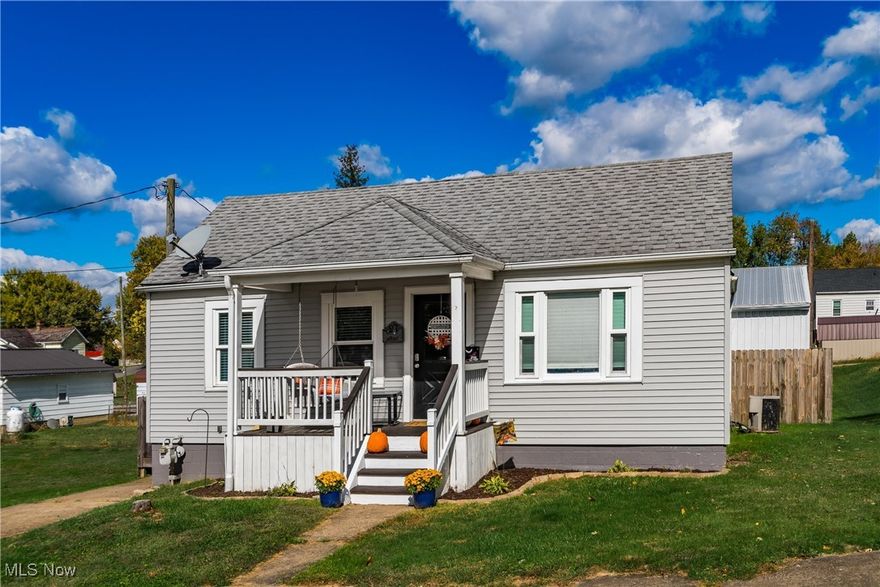 Charming Three Bedroom Home featuring an updated kitchen with an open floor plan and a recently remodeled interior. Enjoy relaxing on the inviting front porch or entertaining in the fenced-in backyard. This property includes a spacous three car garage with a finished area and convenient half bath. A must see, move in ready home full of character and modern updates!