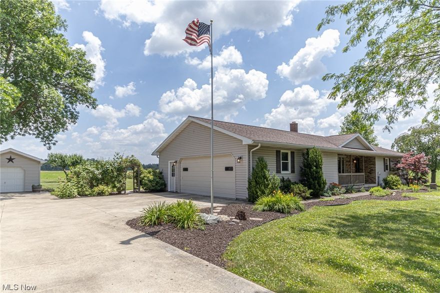Welcome to this spectacular property that features a beautiful 3 bedroom ranch and a 40’x60’ insulated hobby garage! This home sits on just under 2 acres of land in beautiful Tiffin, OH. This home is immaculate from top to bottom. It features hardwood floors, fresh carpet and ceramic tile. Inside features a large eat in kitchen with solid wood cabinets and corian counter tops with a peninsula. Adjacent to the kitchen is the first floor laundry room with access to the garage and back patio. Three bedroom on the first floor including the master bedroom with access to the master bath. Finished basement with a walk out cellar to the patio! Also in the basement is a large area for storage where you will find the brand new hot water tank (2023) and furnace and a/c (approx. 2008). The electric panel has been updated to 200 amp service. The 2 car attached garage is extra large with a workshop or storage space added. The backyard features a stamped concrete patio, wooden porch, gazebo and cella