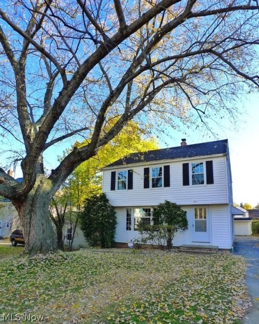 Terrific Lomond Shaker Heights Colonial that really offers a lot of home for the money! Remodeled extensively to include new windows & roof in 2016, rear Deck added on back & hot water tank replaced in 2016 along with a terrific new look throughout the inside. Updated Eat-in Kitchen with ceramic floors, granite counters, Whirlpool Stainless Steel appliances & glass tile backsplash.  Opens to Dining Room with hardwood floors, built in cabinets with door to newly built rear Deck in yard. Living room has a large picture window & hardwood floors. Second floor boasts two remodeled full bathrooms (Master & Jack & Jill Bath)  & 3 bedrooms with gleaming hardwood floors.  Master Bedroom is a Suite with large walk-in closet! Central A/C! Lower level Rec Room has tasteful decor, new 2016 carpeting, a retro Wet Bar for entertaining, glass block window & built in shelving. Newly landscaped rear yard, one car detached garage & asphalt driveway finish off this shining penny! Close to shopping, restau