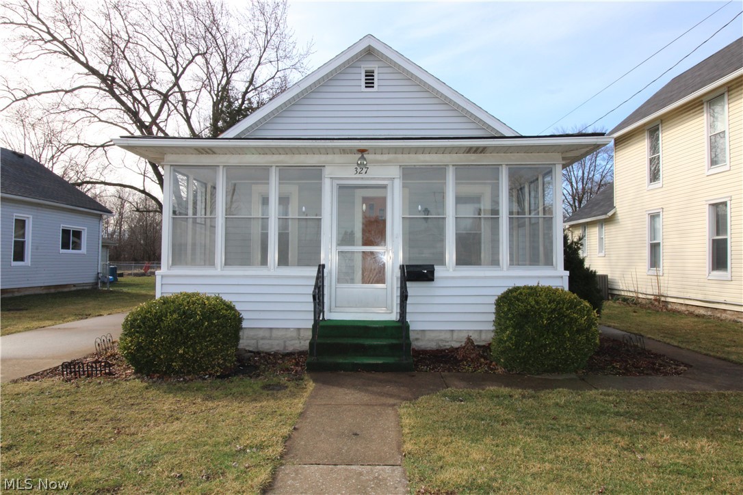 Small little bungalow on 6th St in town! 1 bedroom, 1 bathroom ranch with a generous 1-car detached garage. Great rental or Airbnb. Property is being sold as-is. The seller will not renegotiate or make any repairs. Call today to take a look! Priced under $100,000!