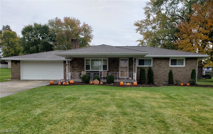 NEW roof, just completed! As you make your way to this beautiful brick ranch you are greeted by fresh landscaping and a covered patio. The spacious living room features a beautiful stone fireplace running the entire width of the room. The kitchen and dinette overlook the back yard. Through the sliding doors your peaceful backyard awaits, relax and enjoy these warm summer nights on the covered patio. Three bedrooms and a beautifully updated bath finish the main floor. If you enjoy entertaining or hosting the holidays wait till you see this fantastic finished basement. This amazing large space plays host to everything you’ll need from watching the game or toasting the new year right at your own neighborhood bar. The lighting under the bar adds some extra ambiance. Through the laundry room you’ll find another great full bathroom, lovely tile work throughout including a floor to ceiling tiled walk in shower accented with glass block, what man wouldn’t love to have his “man cave” bathroom e