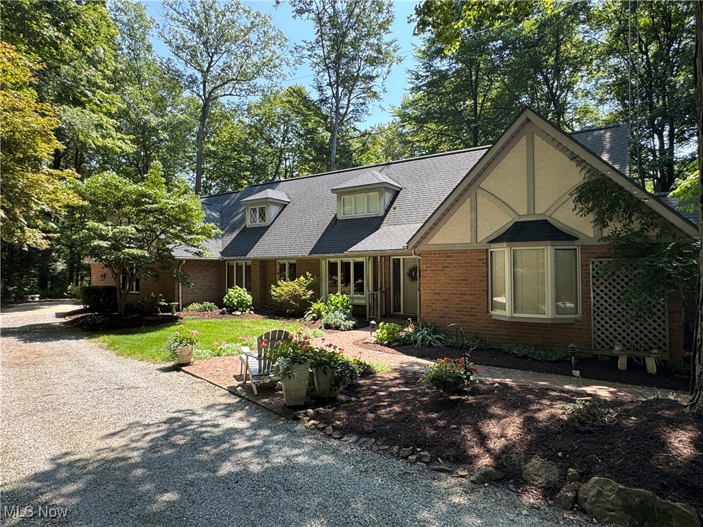 A rare find near Berlin! Situated on over 3 acres, this 4-bedroom home has 2843 sq ft of living area, was built in 1988 with many updates. The main floor has a Mullet kitchen with quartz countertops, breakfast nook, dining room, family and living rooms (both with fireplaces), a large master bedroom and bath, an additional bedroom and ½ bath, first floor laundry and a 12’x16’ screened in porch. The upstairs has 2 bedrooms and 1 full bath. There is a full walkout basement. Utilities include a newer natural gas forced air furnace and central air conditioning, an auxiliary woodburning stove, central vac, public water and private septic. 2-car-attached garage. The 3.1 acres has approximately 2 acres of wooded privacy, a small creek, with the balance being an open field perfect for pasture, small barn etc. Home has been tastefully updated and is move-in ready.
