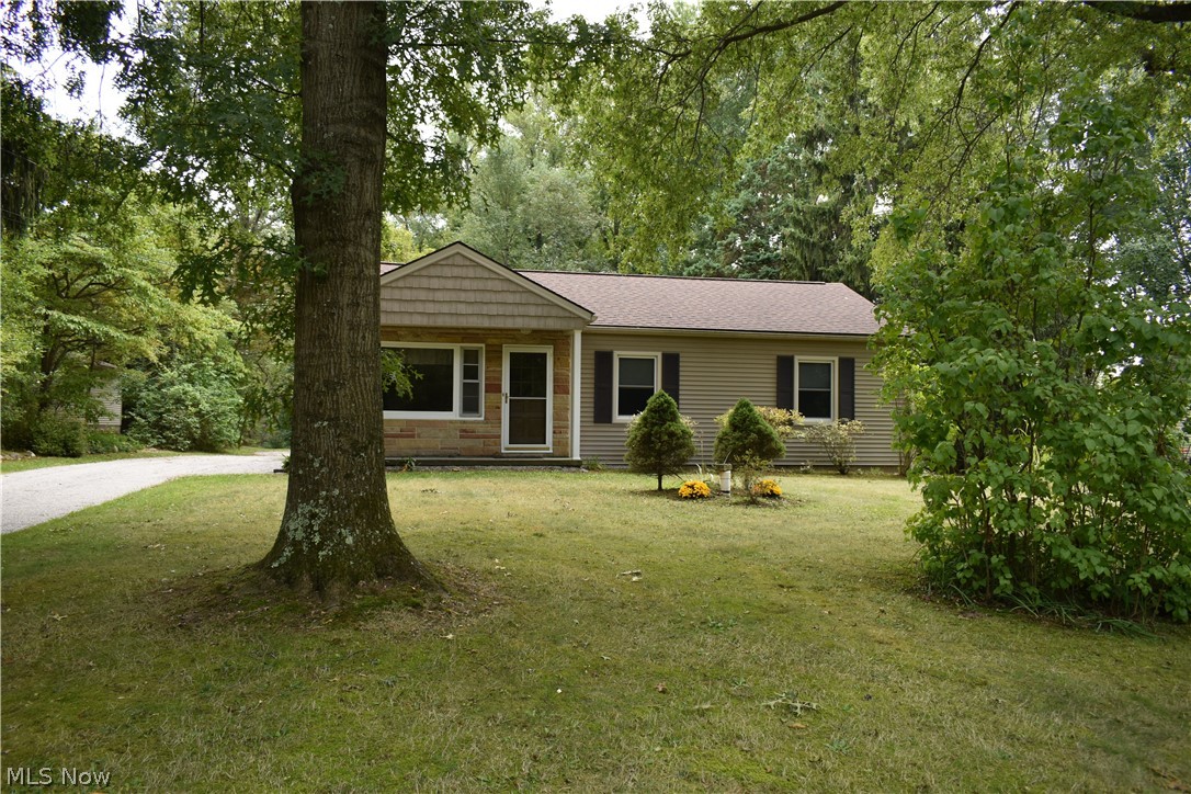 Don't miss out on this charming ranch on over an acre! Three bedrooms and two baths with a large eat-in kitchen. Sit on your front porch and enjoy a private peaceful view. Shed with optional electric and 2 car garage. Main bathroom floor replaced in 2020, new carpet throughout. 10 ton of gravel added to drive. Radon mitigation system just added and septic in process of being replaced. New hot water tank in 2017. Full bath added to basement in 2013. New basement glass block and roof in 2012. New vinyl siding gutters, furnace, AC, water softener, upstairs bath remodeled new main electric panel in 2009. New windows 2003. New well, pump, and tank in 1999.